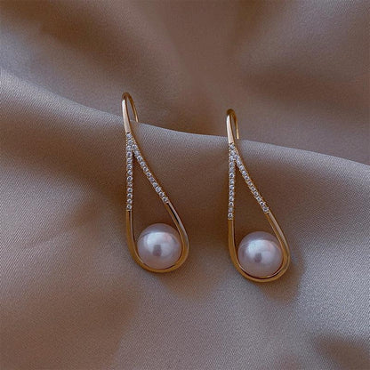 Boucles d'oreilles en perles rose doré