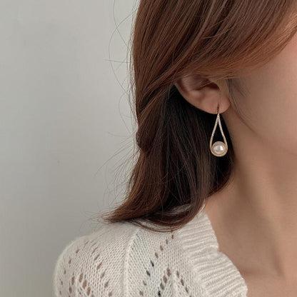 Boucles d'oreilles en perles rose doré