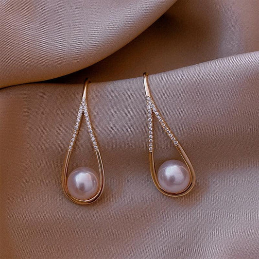 Boucles d'oreilles en perles dorées roses