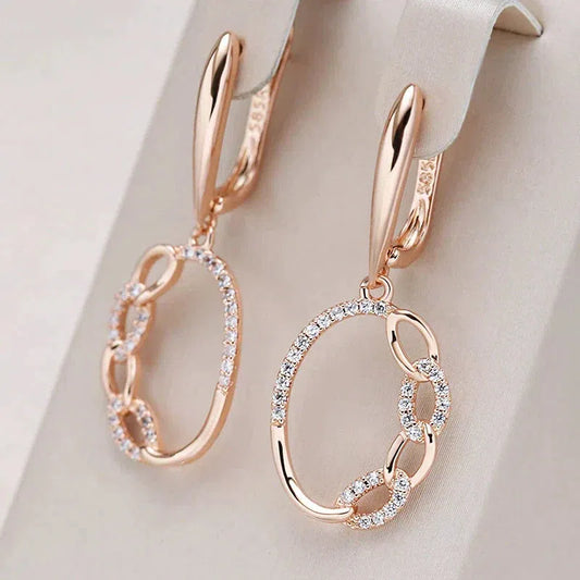 Boucles d'oreilles élégantes avec zirconium doré