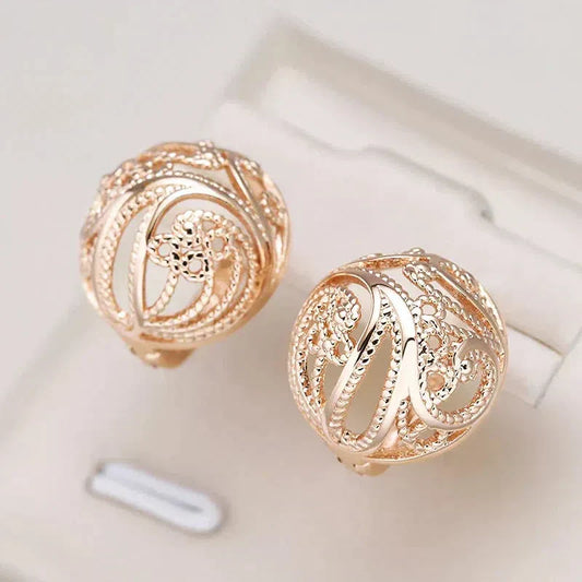 Boucles d'oreilles élégantes en forme de boule creuse en or