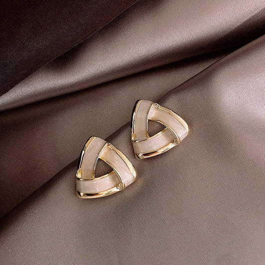Boucles d'oreilles en perles dorées géométriques modernes