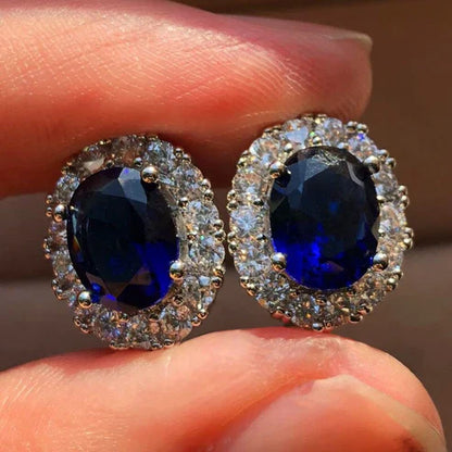 Boucles d'oreilles en saphir blanc ovales
