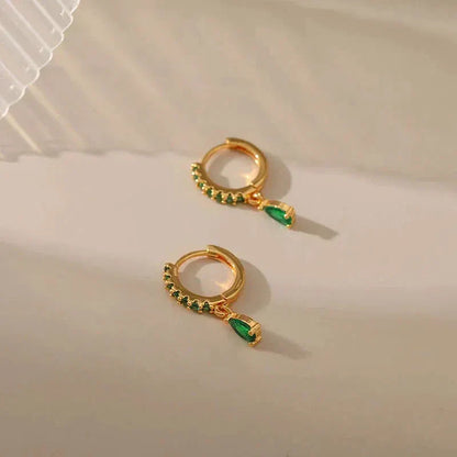Boucles d'oreilles en zirconium avec émeraude en or