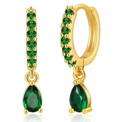 Boucles d'oreilles en zirconium avec émeraude en or