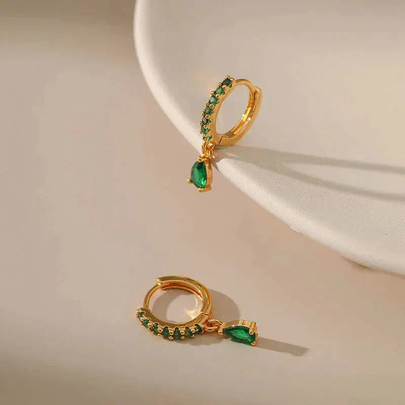 Boucles d'oreilles en zirconium avec émeraude en or