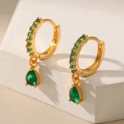 Boucles d'oreilles en zirconium avec émeraude en or