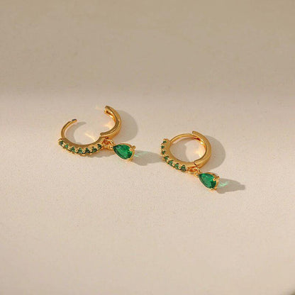 Boucles d'oreilles en zirconium avec émeraude en or