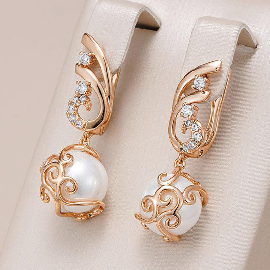 Boucles d'oreilles élégantes avec des perles d'eau douce