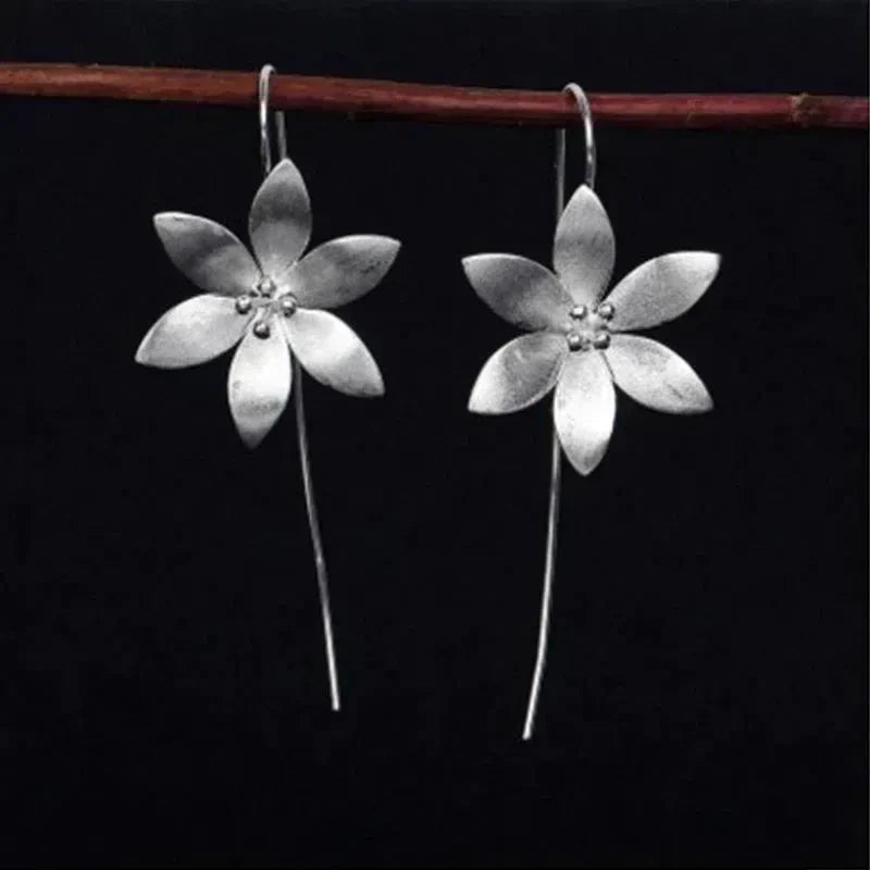 Boucles d'oreilles en fleur bohème plaquées argent