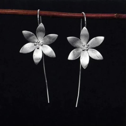 Boucles d'oreilles en fleur bohème plaquées argent
