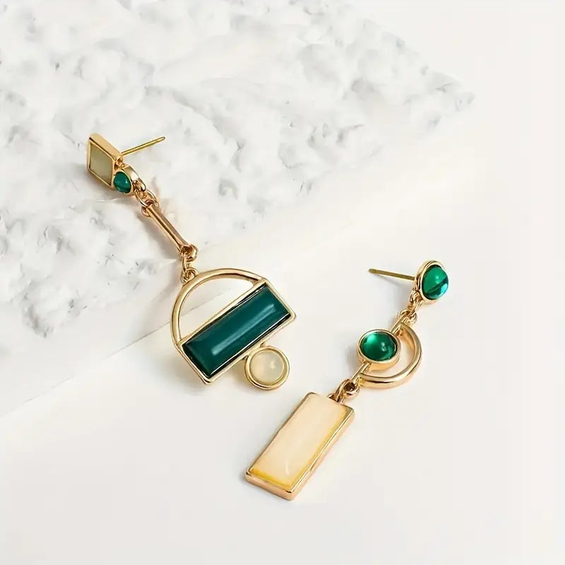 Boucles d'oreilles géométriques pendantes en or émeraude