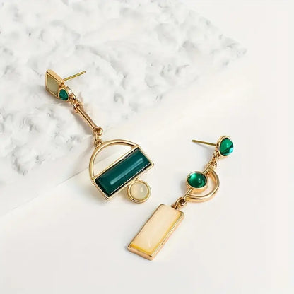 Boucles d'oreilles géométriques pendantes en or émeraude