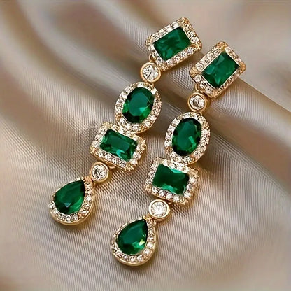Boucles d'oreilles pendantes en or et émeraude multi-formes