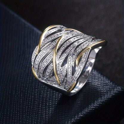Bague tressée en argent et or