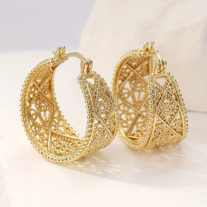 Boucles d'oreilles créoles florales dorées bohèmes