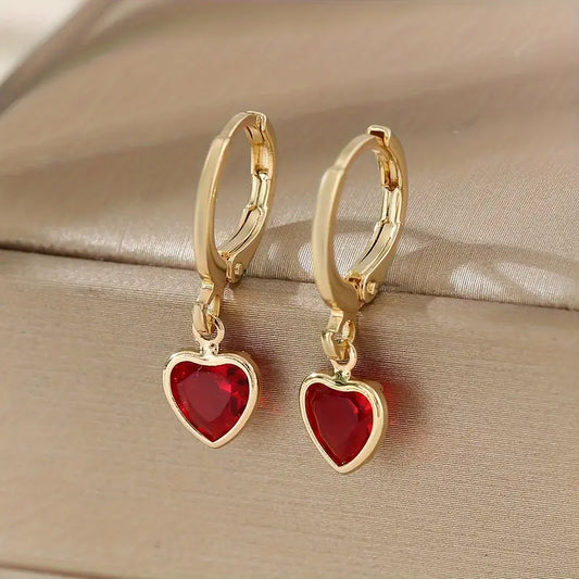 Boucles d'oreilles en or avec cœur en rubis