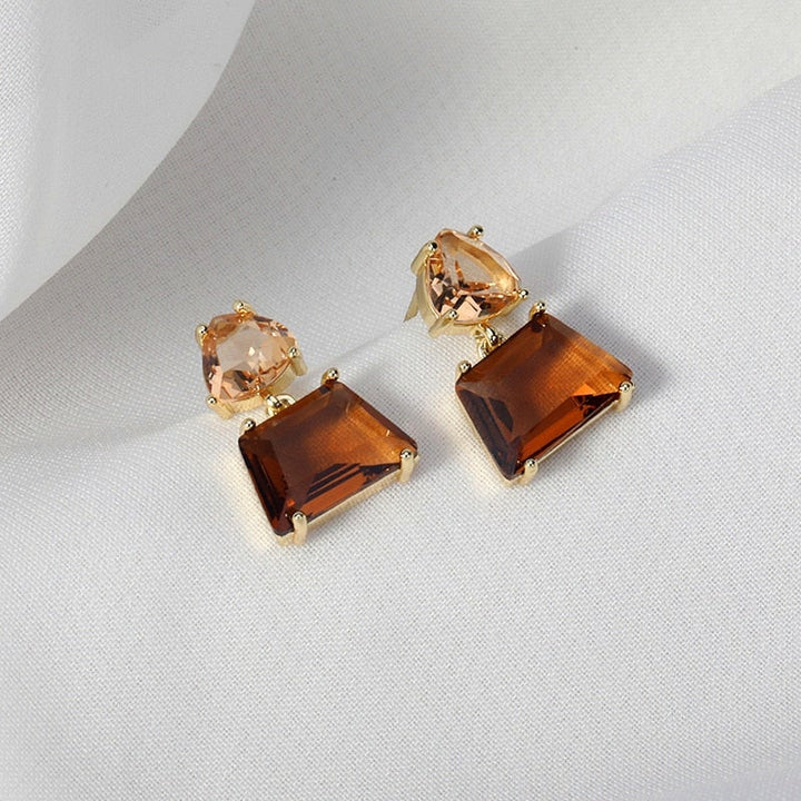 Boucles d'oreilles en cristal élégant du désert en or