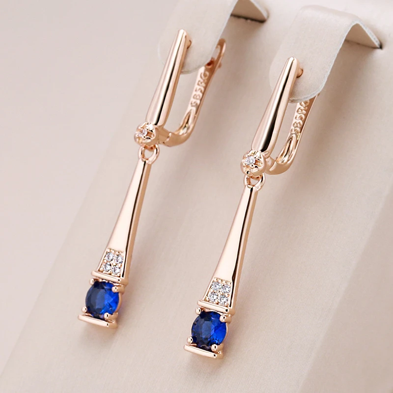 Boucles d'oreilles en pendentif cristal bleu en or