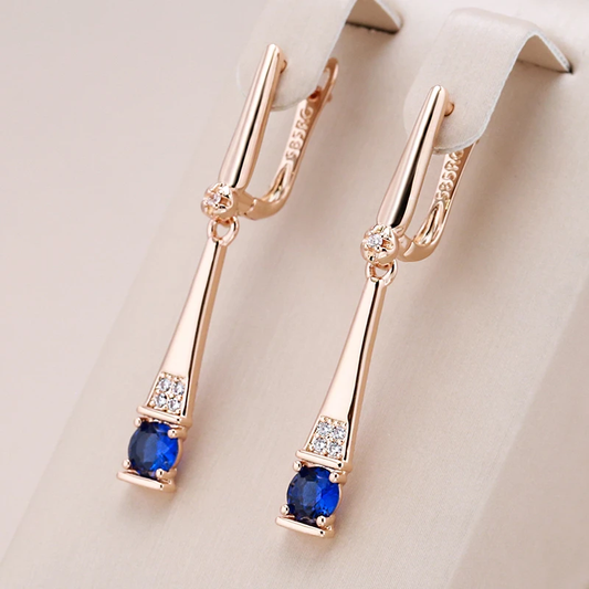 Boucles d'oreilles en pendentif cristal bleu en or