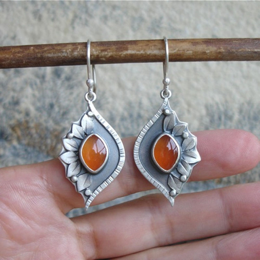 Boucles d'oreilles boho orange avec cristaux