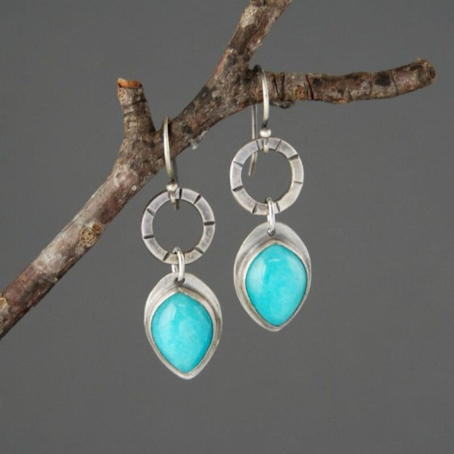 Boucles d'oreilles vintage avec pierre bleue en argent