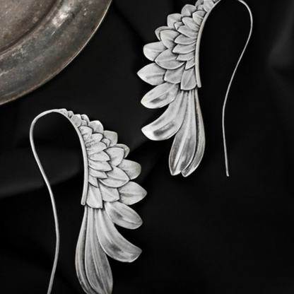 Boucles d'oreilles vintage à ailes en argent