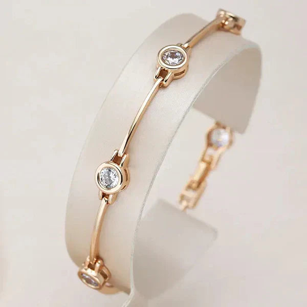 Offre 1+1 : Boucles d'oreilles élégantes en or et cristal + Bracelet élégant avec zirconias en or