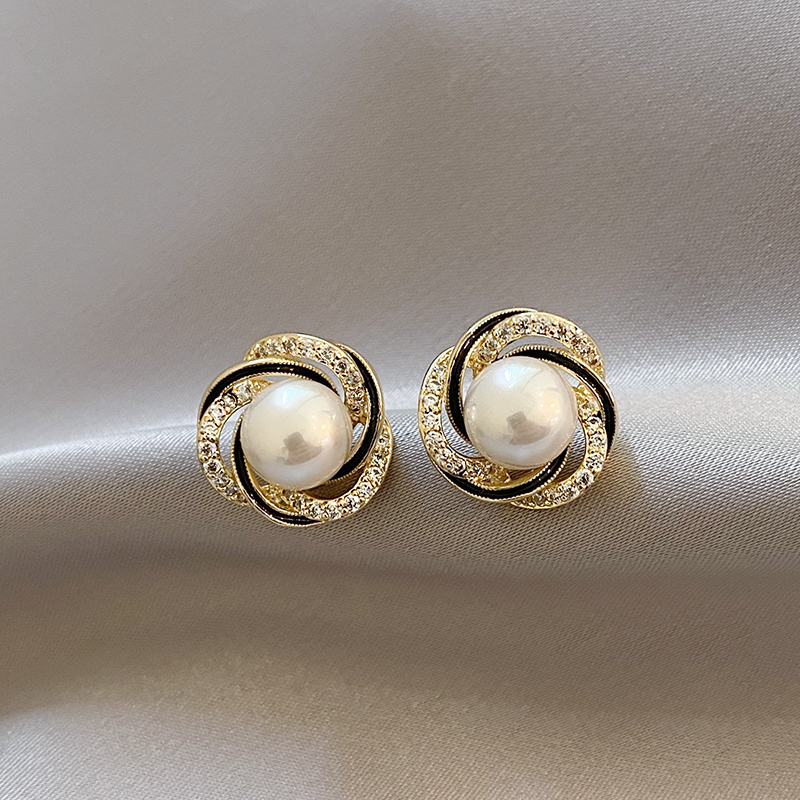 Boucles d'oreilles en boule dorée brillante