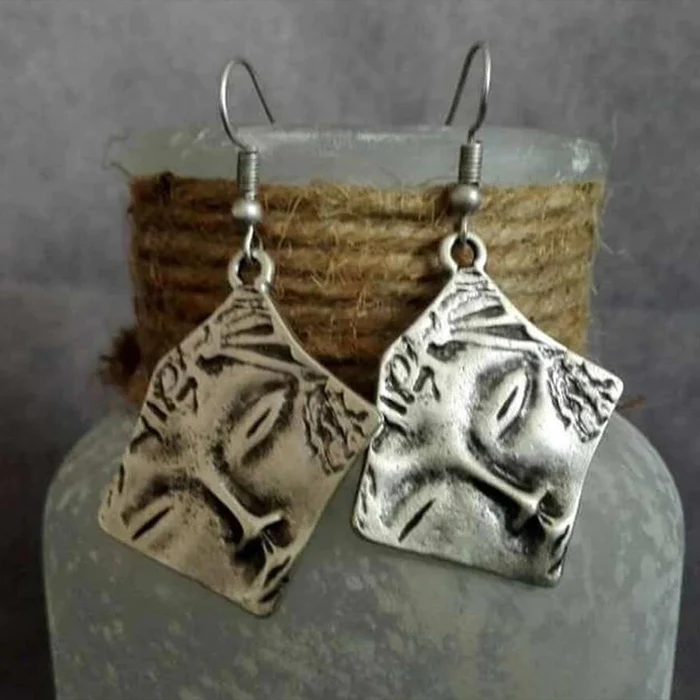 Boucle d'oreille en argent vintage
