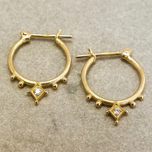 Boucles d'oreilles vintage dorées avec des cristaux