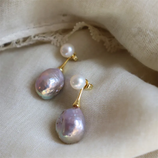 Boucles d'oreilles en perles violettes élégantes