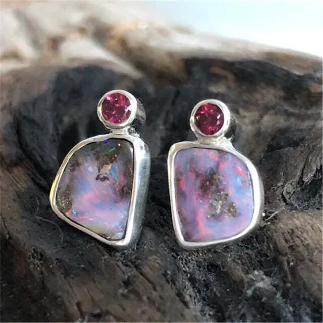 Boucles d'oreilles vintage lilas avec zirconia rouge