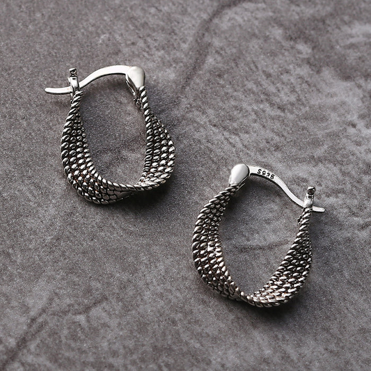 Boucles d'oreilles en argent vintage irrégulières