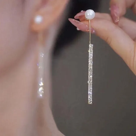 Boucles d'oreilles pendantes en perles élégantes et lumineuses