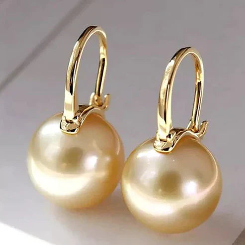 Boucles d'oreilles en perles dorées élégantes
