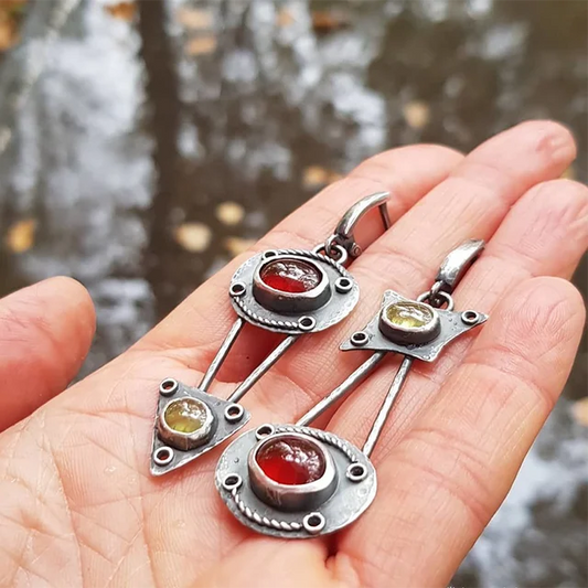 Boucles d'oreilles mécaniques en cristal de feu