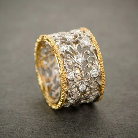 Bague ornée en argent et or