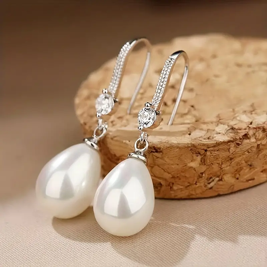 Boucles d'oreilles en perles avec des perles brillantes