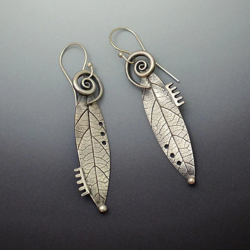 Boucles d'oreilles vintage en argent sterling avec des feuilles dentelées