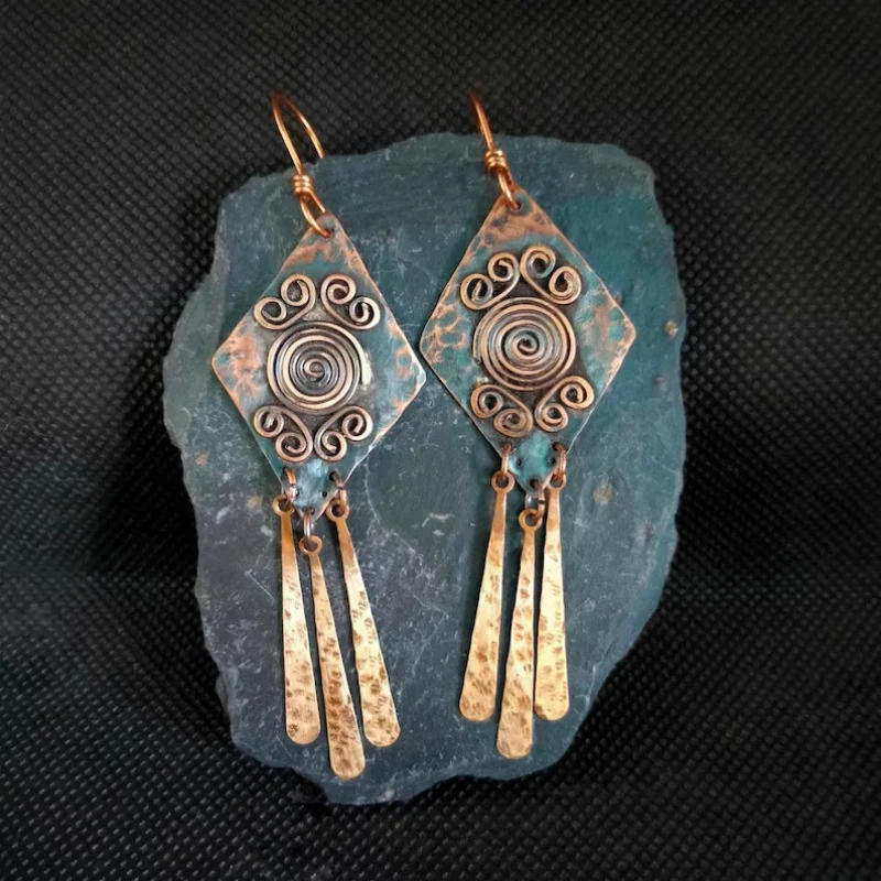 Boucles d'oreilles vintage pendantes bronzées