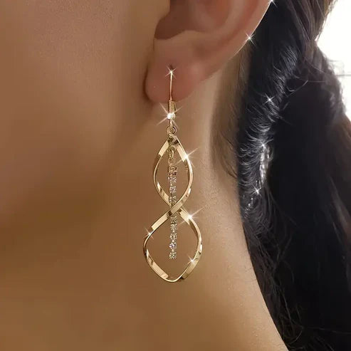 Boucles d'oreilles en or en spirale suspendue