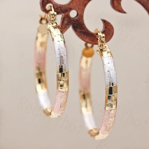 Boucles d'oreilles créoles en or et rose blanche