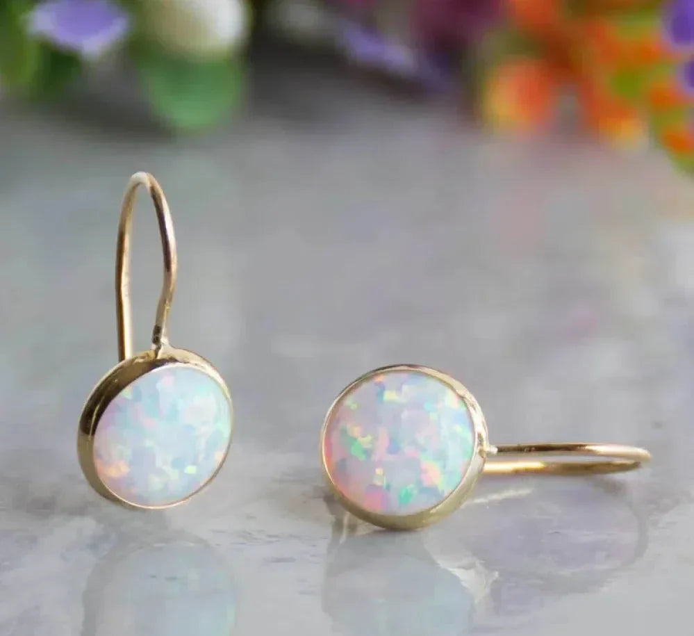 Boucles d'oreilles en or avec pierre opale vintage